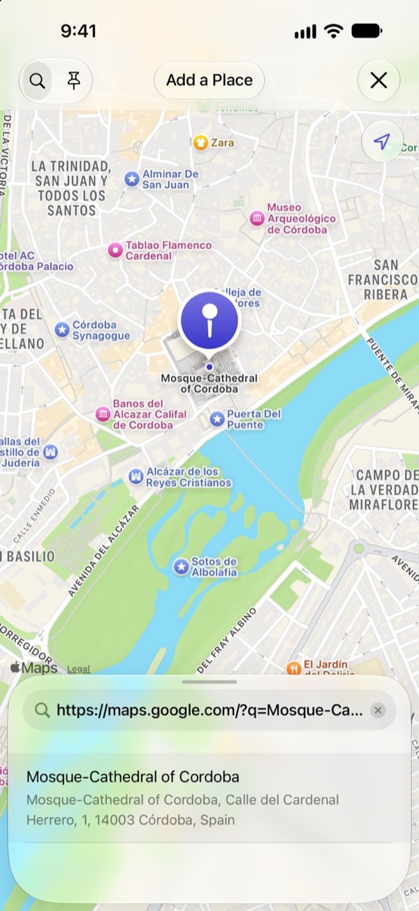 The Add a Place screen with a pasted Google Maps link and the Mosque-Cathedral of Córdoba found on the map